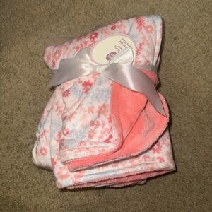 Floral Baby Blanket with Pink and White Design